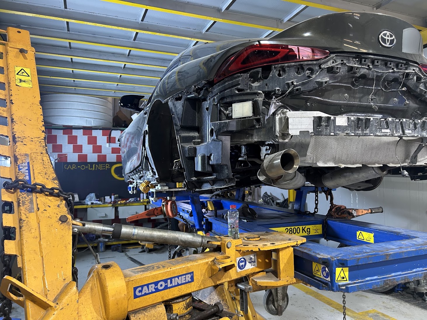 Professional car chassis alignment and frame straightening setup in Sharjah