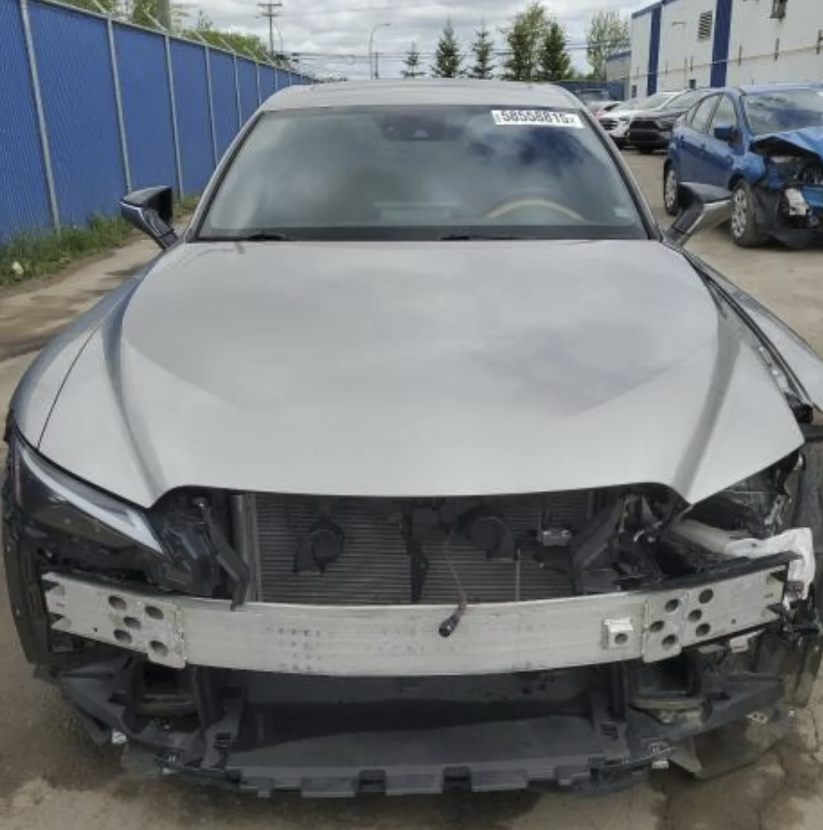 Vehicle protective masking before spray painting Drive Zone Auto Main